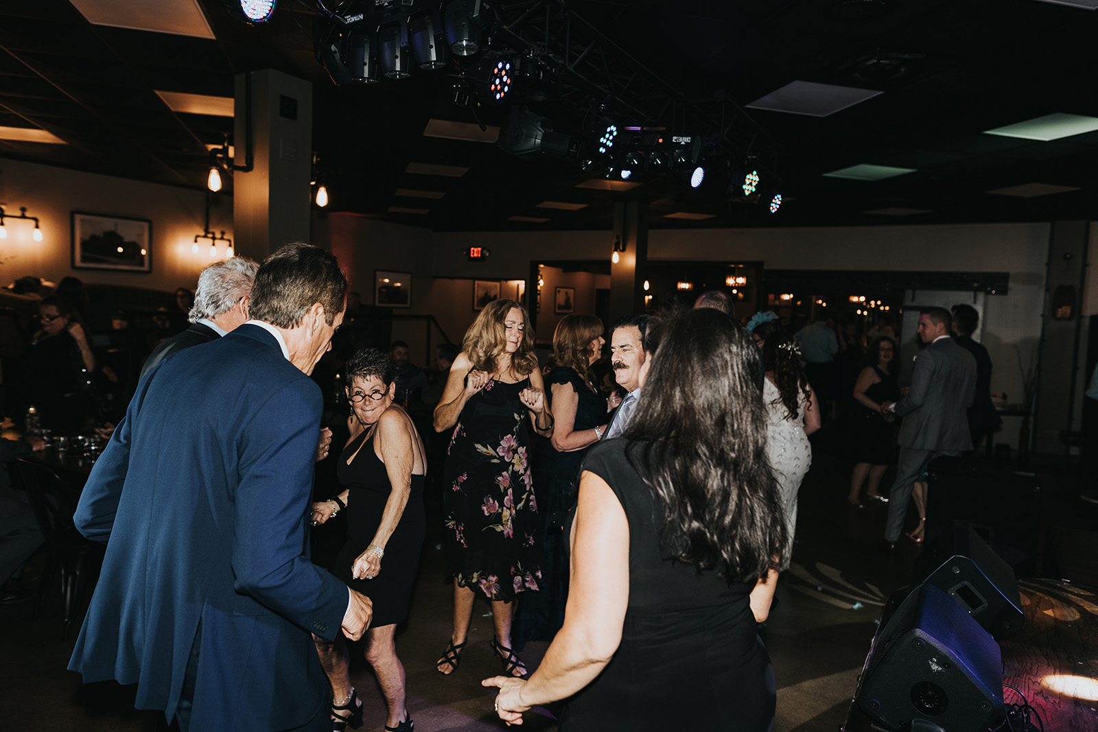 Dancefloor at Ashley & Dan's Wedding Reception at Rivet: Canteen & Assembly on March 26th, 2022. Photography taken by Shiloh Leath Photography.